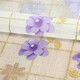 Клеенка силиконовая 0,6*20 м цветочки фиолетово-золотые на прозрачно-белом Baizheng (1/1)